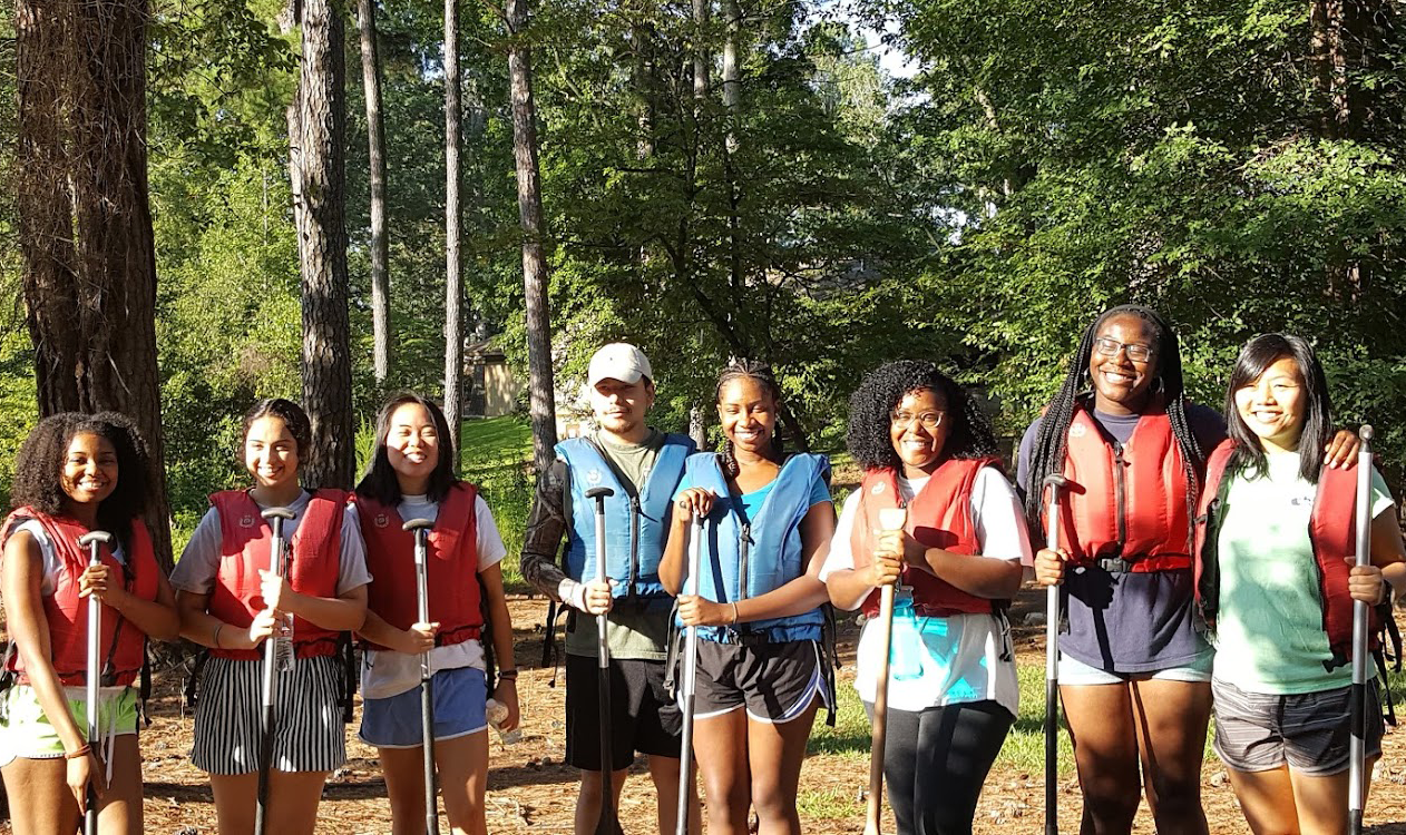 Seven women and one male GT students during a hiking Diversity Ambassadorsretreat.