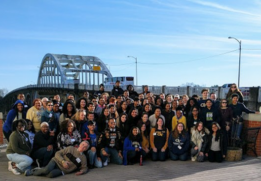 Group photo in front of the Edmund Pettus Bridge, Selma, Alabama.